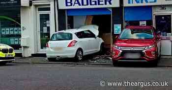 Pictures: Cars smash into shop front