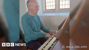 Organist's 18-hour hymn recital for cancer charity