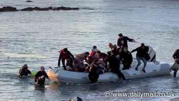 Moment dinghy of migrants land on idyllic Greek beach as shocked British tourists look on