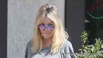 Heather Locklear, 63, goes braless in T-shirt dress as she leaves nail salon in LA