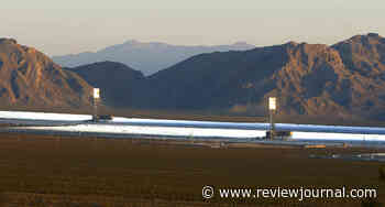 What are those towers surrounded by fields of mirrors off I-15?