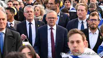 Watch video of the rowdy moment Anthony Albanese is heckled at an October 7 memorial event in Melbourne