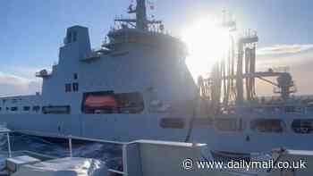 Amazing moment Royal Navy ship is refuelled in the middle of a voyage after machine gun operation