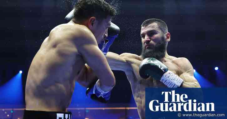 Artur Beterbiev beats Dmitry Bivol on points to become undisputed champion