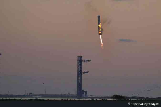 In an engineering feat, mechanical SpaceX arms catch Starship rocket booster at landing pad