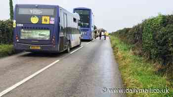 Child and woman in her 30s fighting for their lives after a double-decker school bus crash in Cornwall: Four other children injured in smash