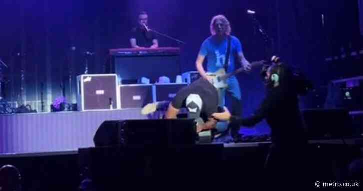 90s rockstar, 58, almost falls off stage in catastrophic moment