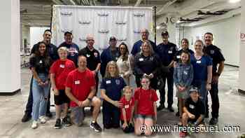 Colo. firefighters fill hundreds of food bags for school children