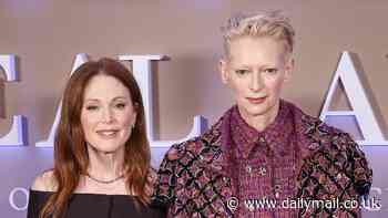 Julianne Moore looks effortlessly chic as she holds hands with quirky-dressed co-star Tilda Swinton at The Room Next Door photocall