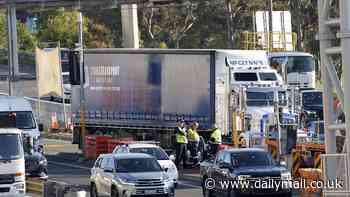 Commuter chaos after 'overheight vehicle' shut Sydney Harbour Tunnel during peak hour