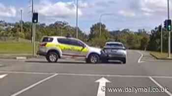 Video captures Queensland Ambulance crashing into car