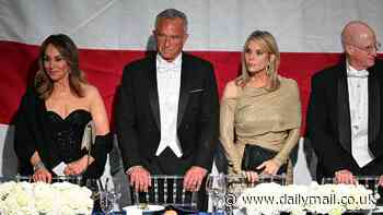 RFK Jr and wife Cheryl Hines' tense exchange as they put on united front at Al Smith charity dinner