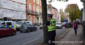 Armed police swoop in busy York street after report of person carrying weapon