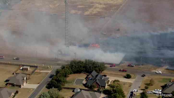 Firefighters battle multiple grass fires near Guthrie