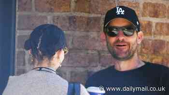 Zoe Kravitz and Tobey Maguire have a chat and share a hug while out in NYC