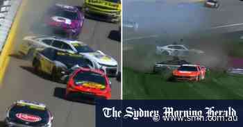 NASCAR gun drives away from wild flip