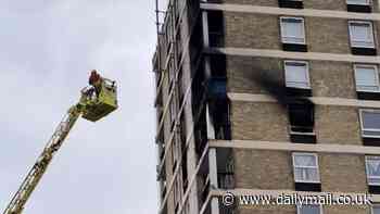 Huge fire at block of flats in East London as ten fire engines and 70 firefighters race to scene