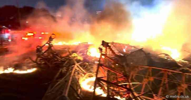 Four killed after helicopter crashes into radio tower and sparks fireball