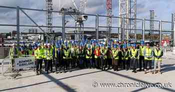 Newcastle HMRC complex mark construction milestone at Pilgrim's Quarter with rooftop ceremony