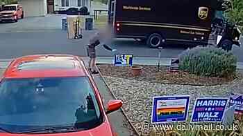 UPS delivery driver is caught on camera erecting very controversial sign on customer's lawn