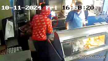 Dramatic moment fish and chip shop staff batter knife-wielding robber when he tries to grab cash from the till