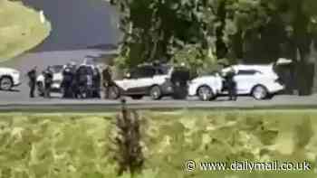 Huge swarm of police cars swoop on a rural property in country Victoria as gunshots ring out