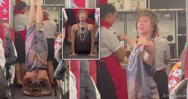 Passengers shock as woman does yoga in the middle of a Jet2 flight