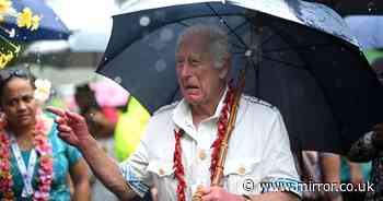 King Charles ditches suit for island life while battling torrential rain