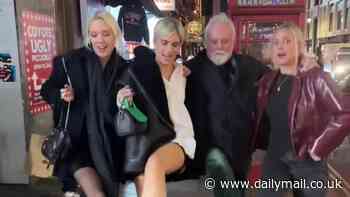 Tigerlily Taylor, 30, does the Can-Can around Soho with her rocker dad Roger, 75, and sisters Rory, 38, and Lola, 24