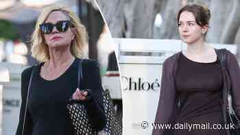 Melanie Griffith, 67, holds onto a cigarette as she takes mini-me daughter Stella Banderas, 27, to coffee