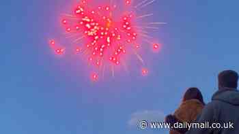 Going out with a bang! Heart-warming moment family give beloved grandfather an explosive send off by sending his ashes up into the night sky on fireworks