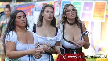 October-feast for the eyes! Glammed-up Sydneysiders show plenty of skin in their best Bavarian garb as they party at beer festival