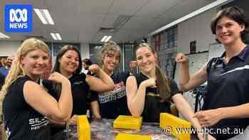 Women smash stereotypes inside meat factory's arm-wrestling club