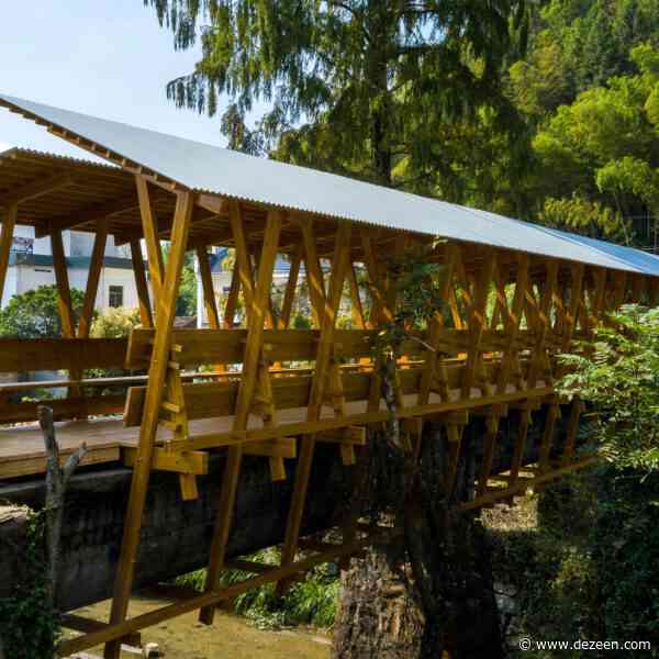 IARA piggybacks stone aqueduct with sheltered timber bridge in China