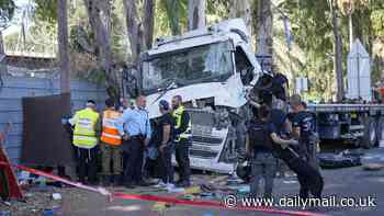 Lorry driver 'terror attack' in Israel as truck rams into crowded bus stop injuring at least 35 people before being 'shot and neutralised' by civilians