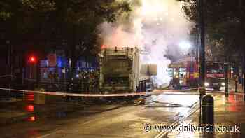 Moment electric bin lorry bursts into flames in central London: Probe into how £580k 'environmentally friendly' vehicle caught fire