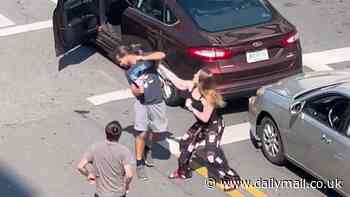 Violent road-rage brawl breaks out on Ohio street...with viewers divided over who won