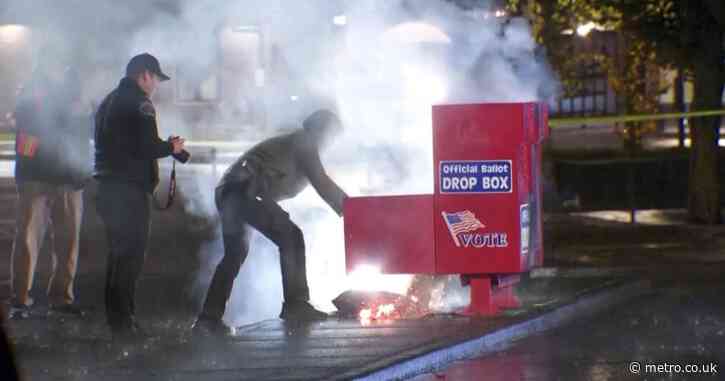 Ballot boxes lit on fire a week before heated US election