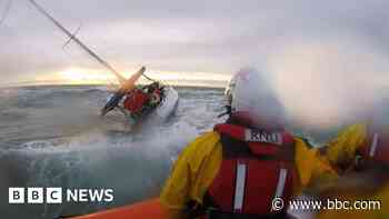 Crew rescued as yacht runs aground on sandbank