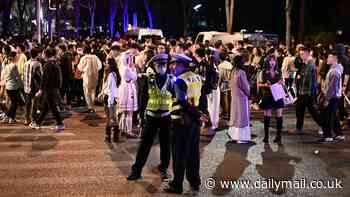 Communist cops' Halloween costume clampdown: Chinese police round up revellers wearing fun outfits such as Batman and Jesus