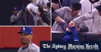 Fan ejected after ripping ball from star's glove