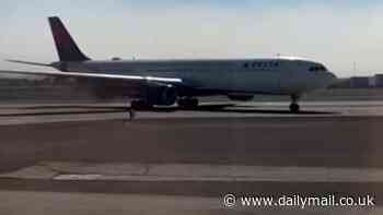 Delta Airlines plane with smoke billowing from engine abandons takeoff at Las Vegas airport