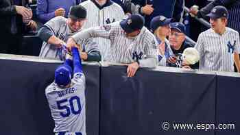 Two WS fans ejected for prying ball from Betts