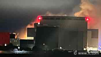 Firefighters start to bring blaze at UK nuclear submarine shipyard under control