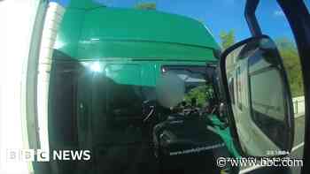 Lorry driver caught eating with a spoon at the wheel