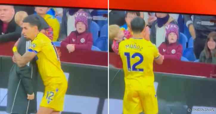 Fans shocked as young football supporter makes rude gesture to rival player