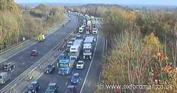 FOUR MILES of traffic following big motorway crash on Oxfordshire border