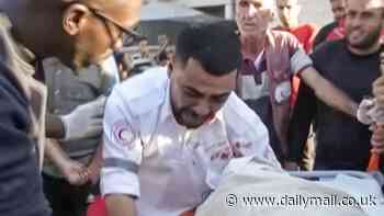 Tragic moment Gaza medic realises the corpse he has wheeled into hospital is his own mother, killed in an Israeli airstrike