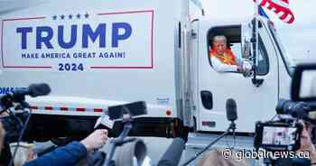 Donald Trump climbs into garbage truck in stunt to call out Biden, Harris