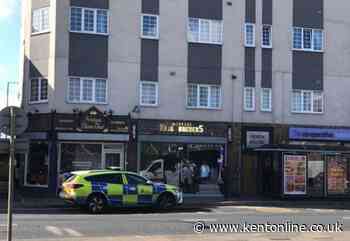 Third man charged after stabbing in high street